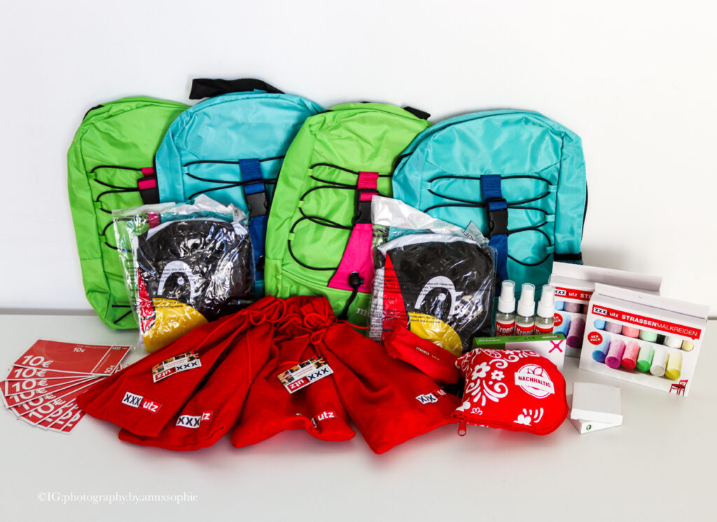 Rucksack, Gutscheine, diverse Goodies von XXX Lutz